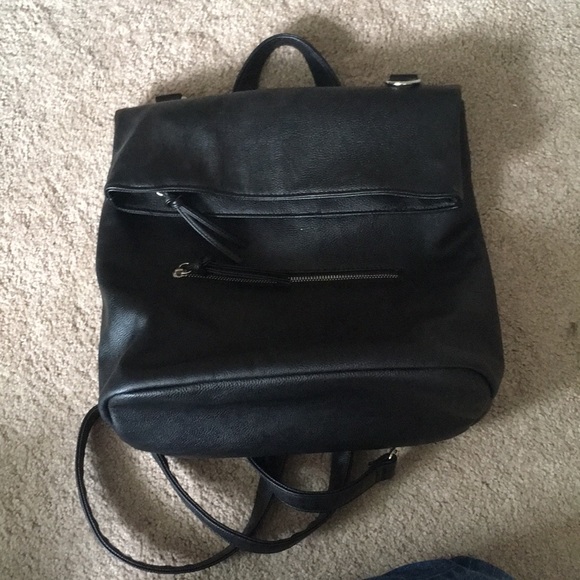 leather fold over backpack